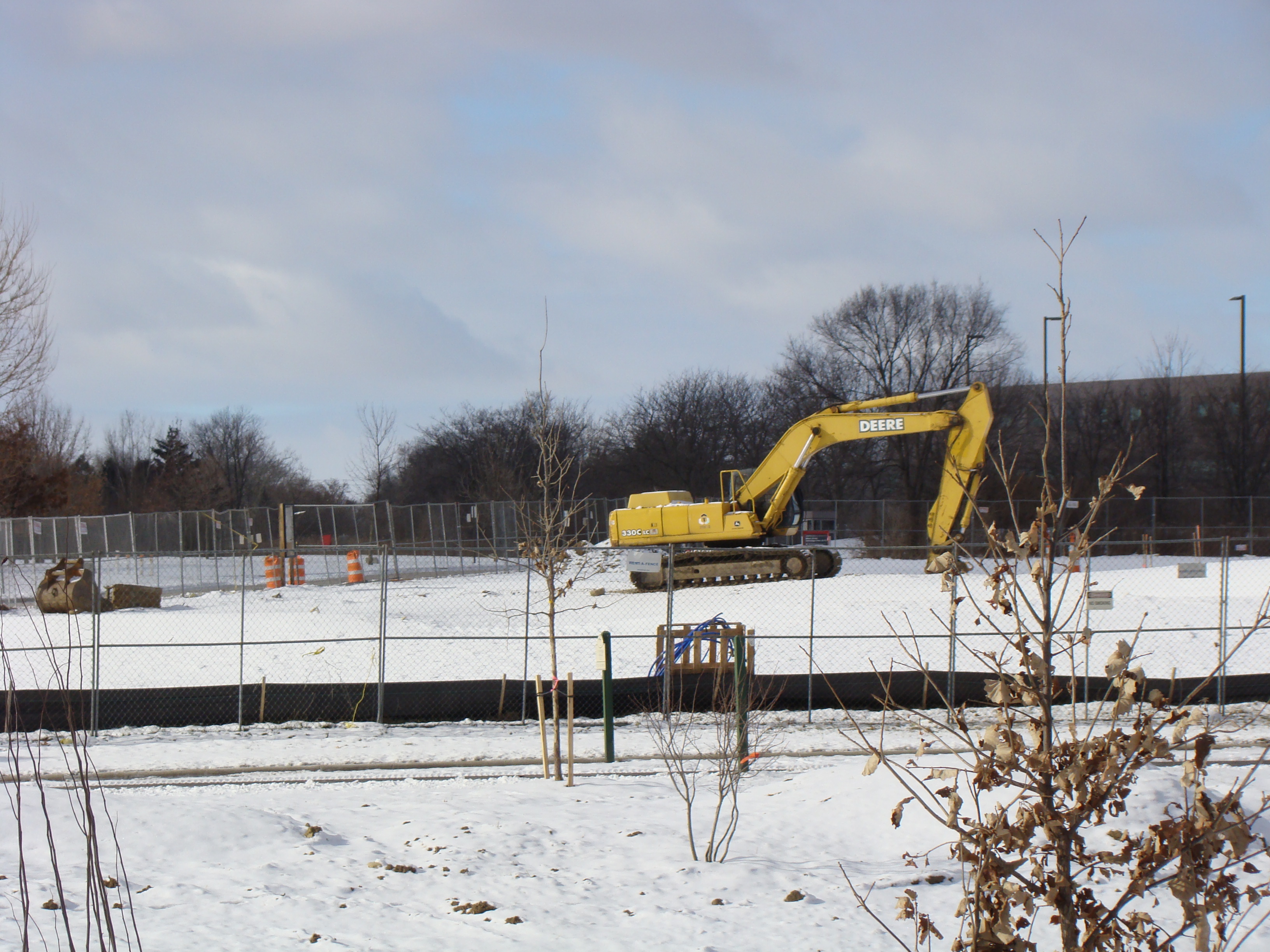 snow excavation construction during winter Herr & Co