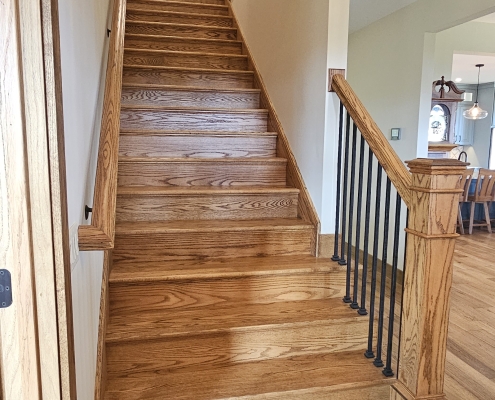 custom wood stairs to second floor of a house