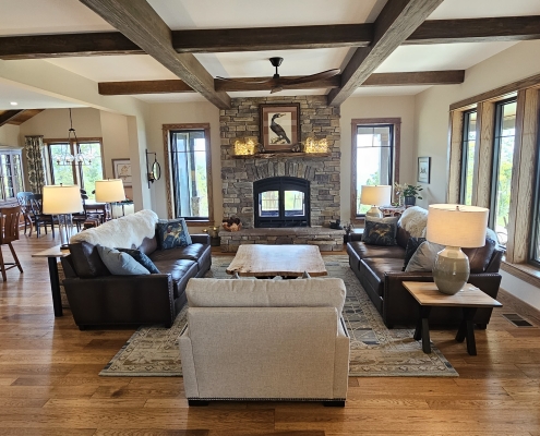 living room with stone chimney