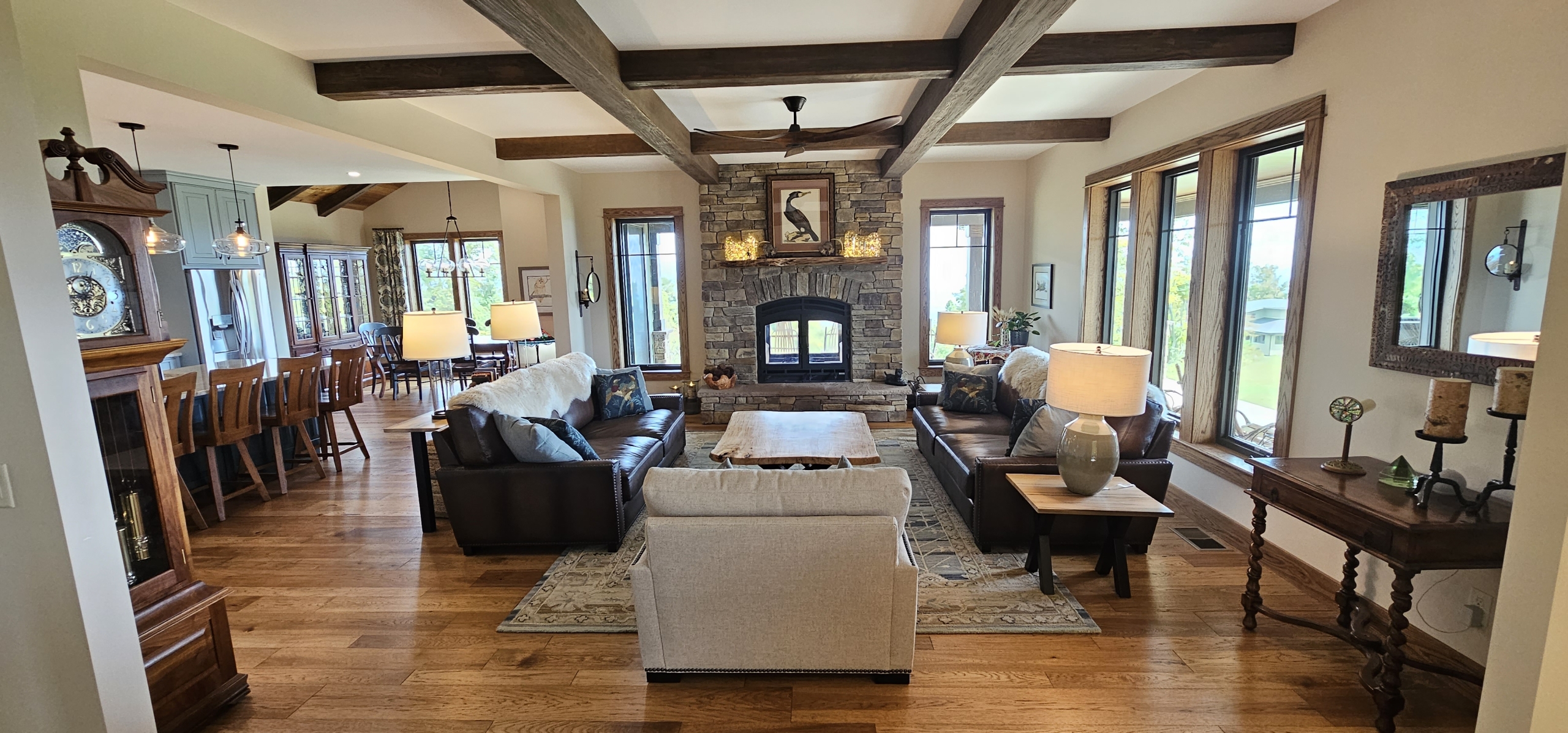 living room with stone chimney