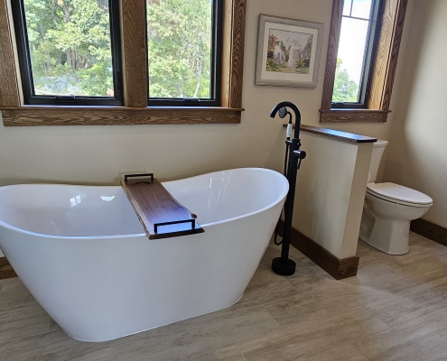 free standing bathtub with window